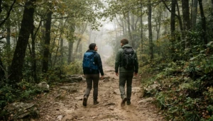 Hikers walking a Smoky Mountains trail near Gatlinburg, illustrating how many days is enough in Gatlinburg for hiking and downtown